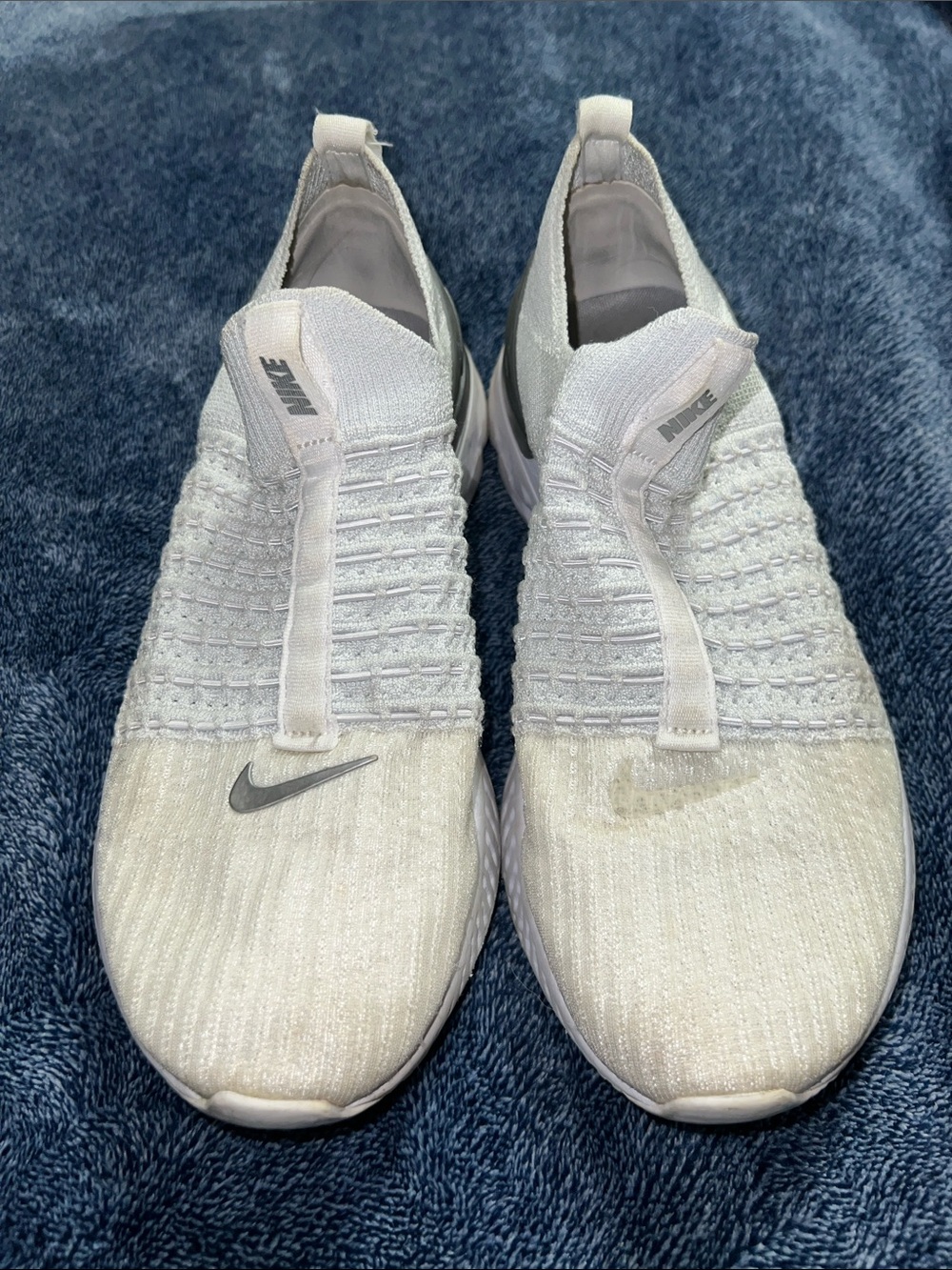 Nike White Knit Slip-On Sneakers with Silver Swoosh